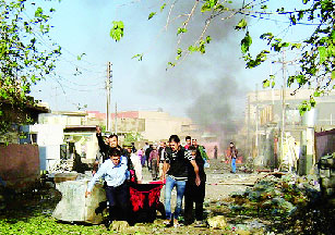 Hiện trường một vụ đánh bom ở Kirkuk, phía bắc Baghdad, Iraq ngày 27-11.